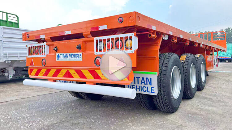 This 60ton flat bed traier for sale is equipped with a thickened headboard, which is used to better fix the container or goods during transportation, prevent the goods from shifting, and better protect the goods.